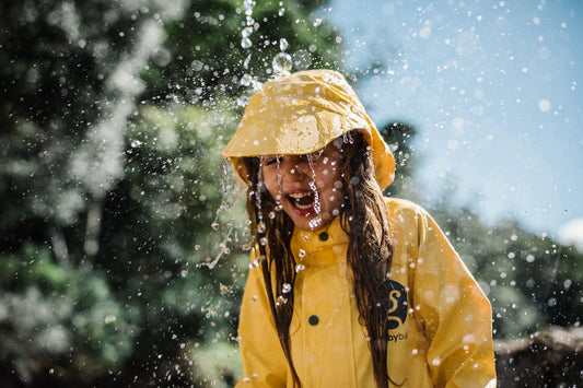 Rain on Kid wearing Waterproof Clothing